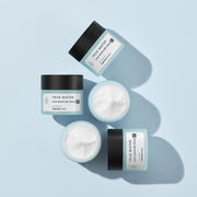 ProtoClinical k-beauty cool blue beauty bottle silhouette with a dark gray lower band on a light background.