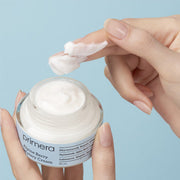 ProtoClinical k-beauty soft aqua and beige beauty graphic on a muted blue-gray background.