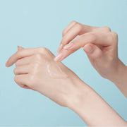 ProtoClinical k-beauty pastel beauty graphic with soft blue, pink, and coral tones on a light background.