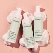 ProtoClinical k-beauty primera BHA Bubble Peeling Cleanser single upright cleanser tube on a warm pink background with a gray center panel.