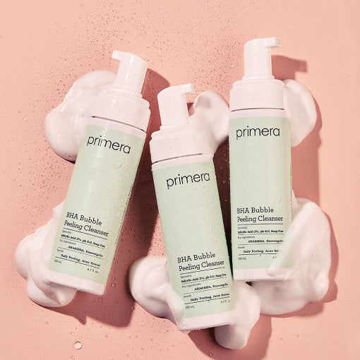 ProtoClinical k-beauty primera BHA Bubble Peeling Cleanser single upright cleanser tube on a warm pink background with a gray center panel.