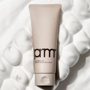 ProtoClinical k-beauty taupe beauty product silhouette centered between pale blue side bands on a light background.