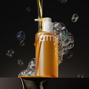ProtoClinical k-beauty warm beige beauty bottle silhouette on a deep navy background.