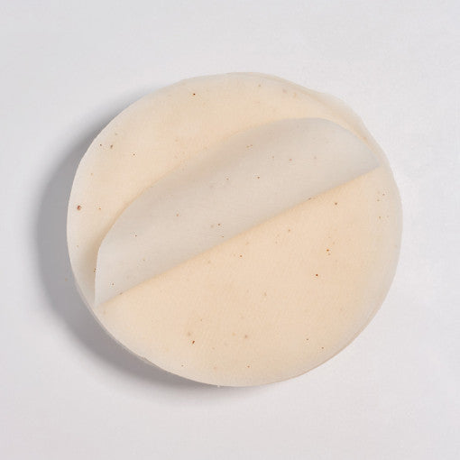 ProtoClinical k-beauty pale gold beauty graphic on a cool gray background.