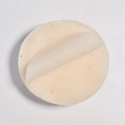 ProtoClinical k-beauty pale gold beauty graphic on a cool gray background.