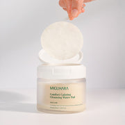 ProtoClinical k-beauty pale aqua and blush beauty product detail on a light background.