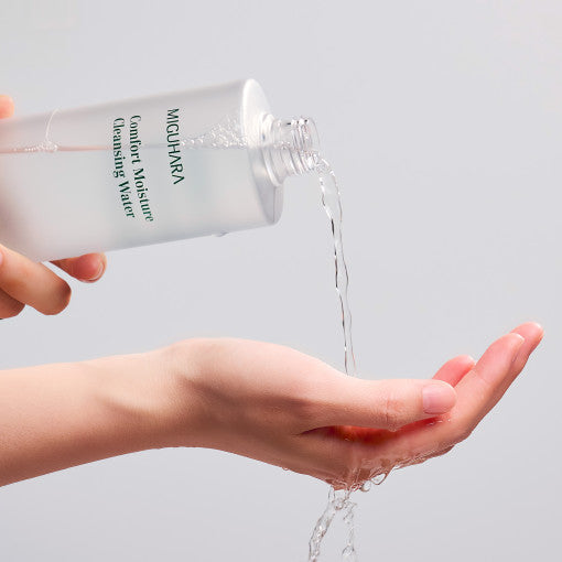 ProtoClinical k-beauty MIGUHARA Comfort Moisture Cleansing Water 400ml pale blue and blush product graphic with a dark horizontal band on a light background