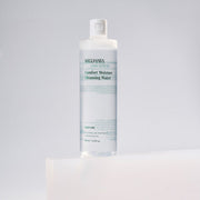ProtoClinical k-beauty MIGUHARA Comfort Moisture Cleansing Water 400ml pale lilac product silhouette with a soft gray center on a light background