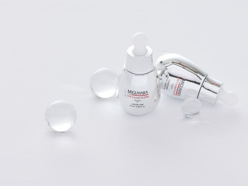ProtoClinical k-beauty MIGUHARA EGF Crystal 10 PPM Origin 25ml single product silhouette with pale lavender and olive tones on a light background