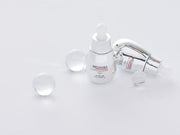 ProtoClinical k-beauty MIGUHARA EGF Crystal 10 PPM Origin 25ml single product silhouette with pale lavender and olive tones on a light background