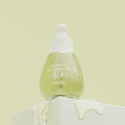 ProtoClinical k-beauty MIGUHARA Green-Tox S.O.S Ampoule 35ml pale yellow product silhouette on a light background
