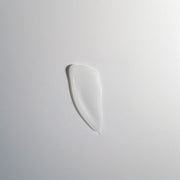 ProtoClinical k-beauty cool gray and pale blue beauty product detail on a light background.