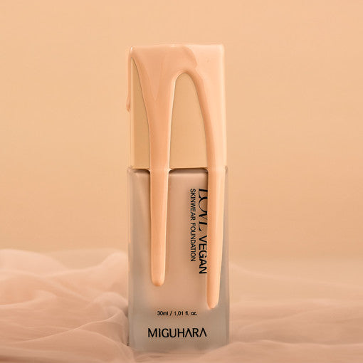 ProtoClinical k-beauty peach-toned beauty product detail on a soft peach background.