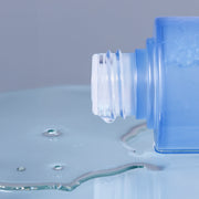 ProtoClinical k-beauty cool blue beauty product detail on a soft lavender and blue background.