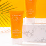 ProtoClinical k-beauty warm orange beauty product detail with a soft white top and pale blue lower edge on a light background.
