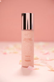 ProtoClinical k-beauty peach-toned beauty product detail on a pale background.