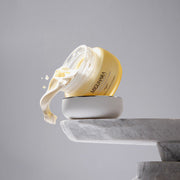 ProtoClinical k-beauty soft beige beauty product detail on a muted lavender background.