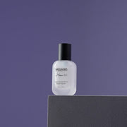 ProtoClinical k-beauty MIGUHARA Vegan Moisture Barrier Repair Ampoule 30ml dark lavender product silhouette with a soft pale vertical center on a muted background