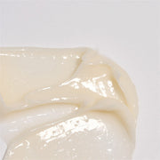 ProtoClinical k-beauty warm beige beauty graphic with a soft yellow center on a light background.