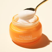 ProtoClinical k-beauty peach and brown beauty product detail on a pale blue background.
