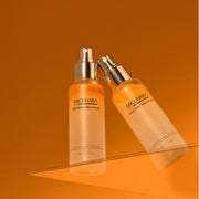 ProtoClinical k-beauty warm orange beauty product detail with vertical tonal bands.