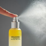 ProtoClinical k-beauty muted olive beauty product detail with soft gray and white tones.