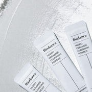 ProtoClinical k-beauty cool gray beauty graphic on a light background.