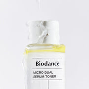 ProtoClinical k-beauty lavender beauty packaging with a soft beige vertical center on a light background.