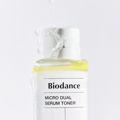ProtoClinical k-beauty lavender beauty packaging with a soft beige vertical center on a light background.