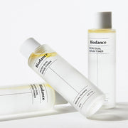 ProtoClinical k-beauty soft sage and gray beauty graphic on a light background.