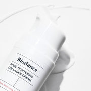 ProtoClinical k-beauty pale blue beauty packaging with a soft gray vertical accent on a light background.