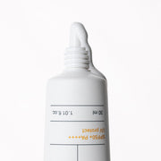 ProtoClinical k-beauty BIODANCE: Skin Barrier Sun Safe (30ml) with a muted gray vertical package centered on a very pale lavender background