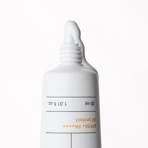 ProtoClinical k-beauty BIODANCE: Skin Barrier Sun Safe (30ml) with a muted gray vertical package centered on a very pale lavender background