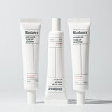ProtoClinical k-beauty neutral beauty product packaging with a dark accent on a white background.
