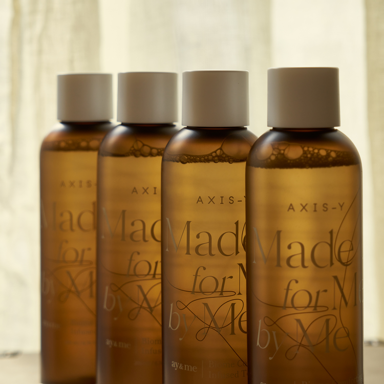 AXIS-Y Biome Comforting Infused Toner 200ml by ProtoClinical displayed in a detailed skincare graphic with the toner packaging on a clean background for a k-beauty routine.