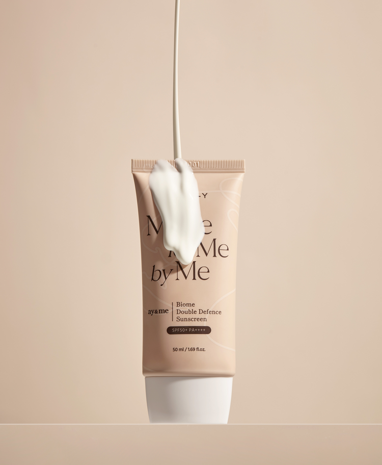 AXIS-Y Biome Double Defense Sunscreen 50ml by ProtoClinical shown in a detailed product graphic with the sunscreen packaging and branded skincare design for a k-beauty routine.