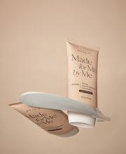 AXIS-Y Biome Double Defense Sunscreen 50ml by ProtoClinical shown in a product information graphic with the sunscreen packaging and branded detail panels for a k-beauty routine.