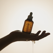 AXIS-Y Biome Radiating Intensified Essence 50ml by ProtoClinical shown in a product detail graphic featuring the essence packaging on a clean background for a k-beauty skincare routine.