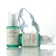 AXIS-Y Vita Frost Chilling Essence 50ml by ProtoClinical displayed in a skincare graphic with the essence bottle and cooling design elements for a k-beauty routine.