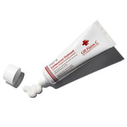 ProtoClinical k-beauty [Cell Fusion C] Centecassol Ointment 40ml close-up of a white ointment tube dispensing cream onto a white surface against a red background