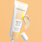 ProtoClinical k-beauty warm gold and peach beauty graphic with a pale vertical center on a light background.