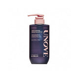 ProtoClinical k-beauty UNOVE DEEP DAMAGE REPAIR SHAMPOO 500ml single upright dark shampoo bottle centered on a soft pink background.