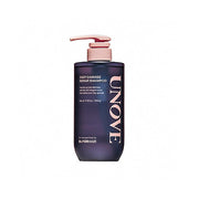 ProtoClinical k-beauty UNOVE DEEP DAMAGE REPAIR SHAMPOO 500ml single upright dark shampoo bottle centered on a soft pink background.