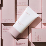 ProtoClinical k-beauty BRTC Mild Pink Tone-Up Sun Cream SPF 50+/PA ++++ 50ml single tone-up sun cream package centered on a clean white background