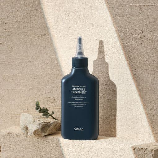 ProtoClinical k-beauty Solep Premier Hi-Gro Ampoule Treatment 150ml single dark gray ampoule bottle centered on a beige background.