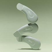 ProtoClinical k-beauty beauty product packaging in soft green and white tones on a light background.
