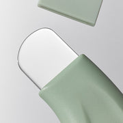ProtoClinical k-beauty beauty product packaging in warm beige and pale green tones on a light background.