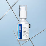 ProtoClinical k-beauty beauty product packaging in warm beige and brown tones on a light background.