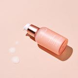 ProtoClinical k-beauty medicube Triple Collagen Serum 4.0 55ml single upright peach serum bottle centered on a pale background.