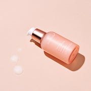 ProtoClinical k-beauty medicube Triple Collagen Serum 4.0 55ml single upright peach serum bottle centered on a pale background.